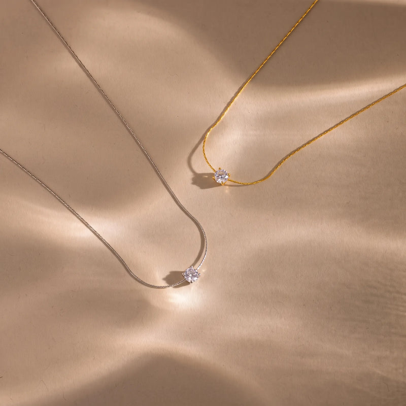 Round solitaire pendant necklace in gold and silver tone, product photo 3