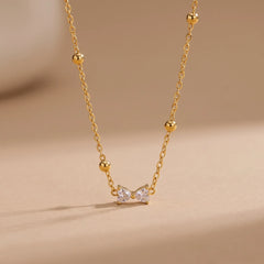 Sparkling Bow Bead Station Necklace, product photo 3